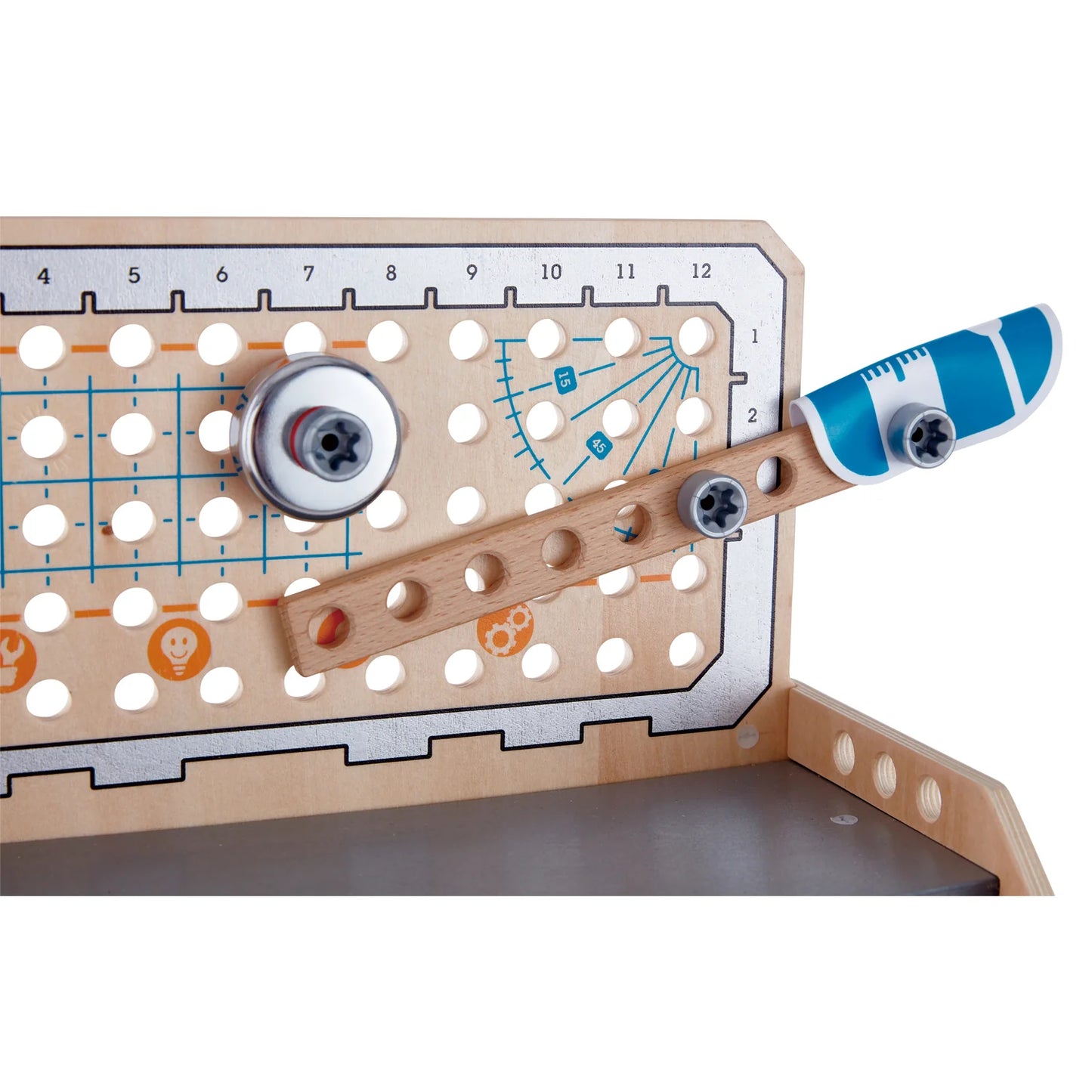 Wooden marble run track with marble and blue track piece on a white background