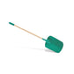 Green shovel with wooden handle on a white background