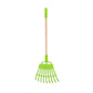 Green garden rake with wooden handle on a white background