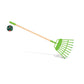 Green garden rake with wooden handle on a white background