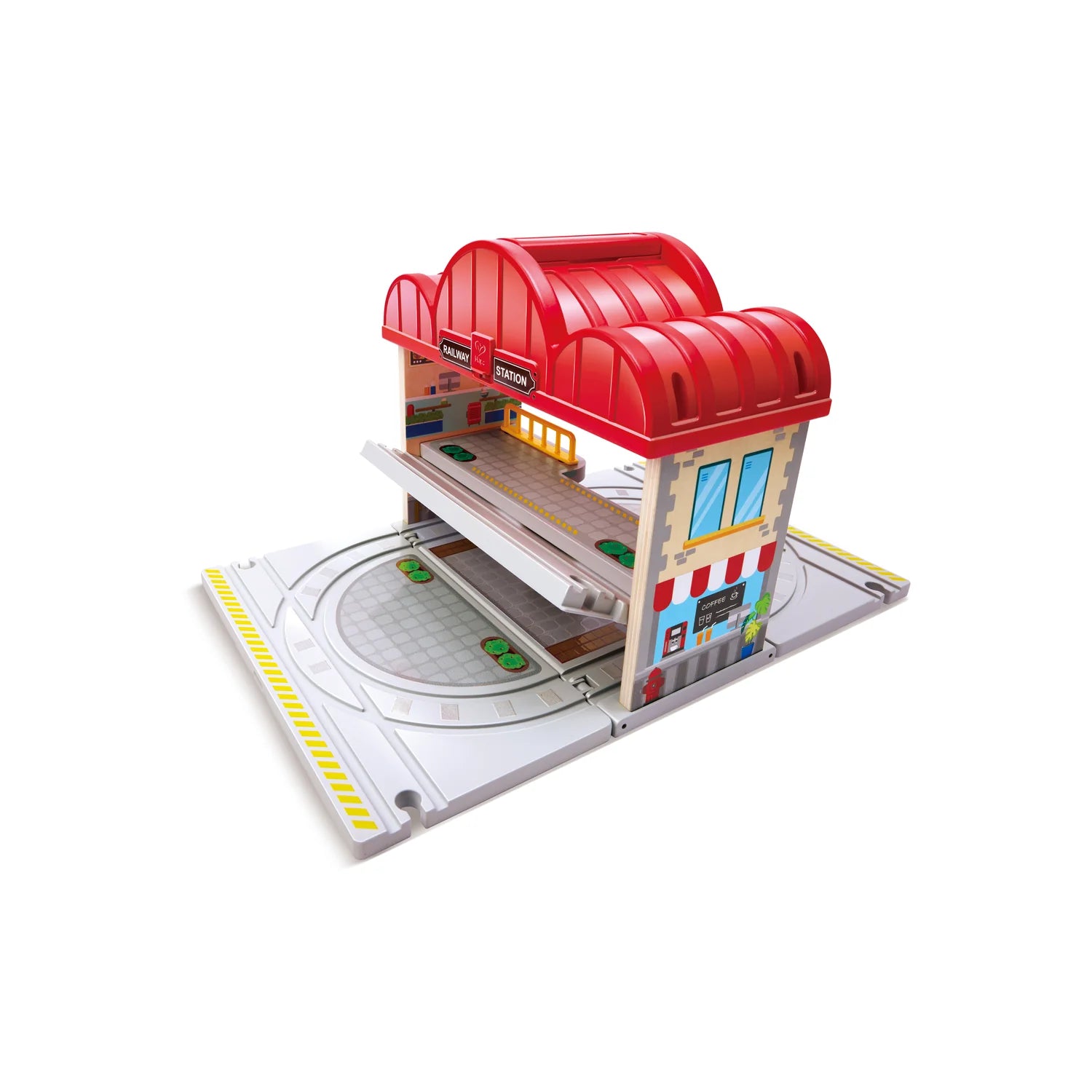 Toy town layout with a red building on a white background