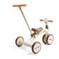 Children's tricycle with a seat and handlebar on a white background