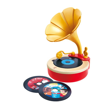 Toy gramophone with spinning records on a white background