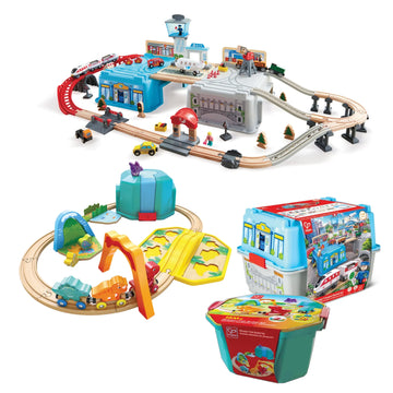 Toy train set with tracks, cars, and buildings on a white background