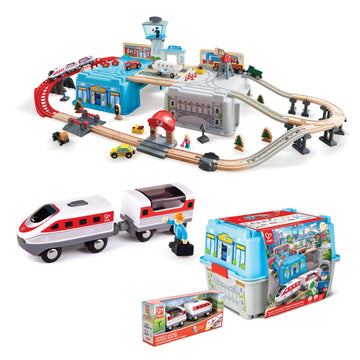 Toy train set with tracks, trains, and accessories on a white background