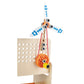 Model airplane wing with propeller attached to a wooden stand on a white background
