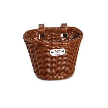 A brown woven bike basket with a white branded tag on the side.
