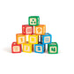 A colorful set of wooden building blocks with numbers and patterns on them, stacked in a pyramid shape.