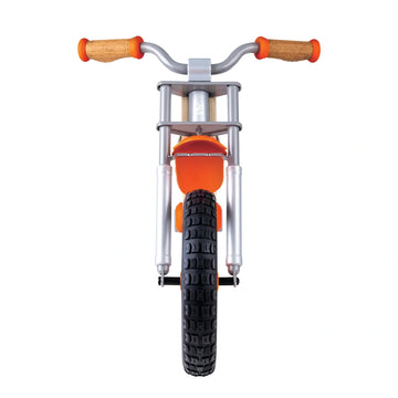 An orange and black Hape Off Road Balance Bike with solid rubber tires and a soft seat for young children.