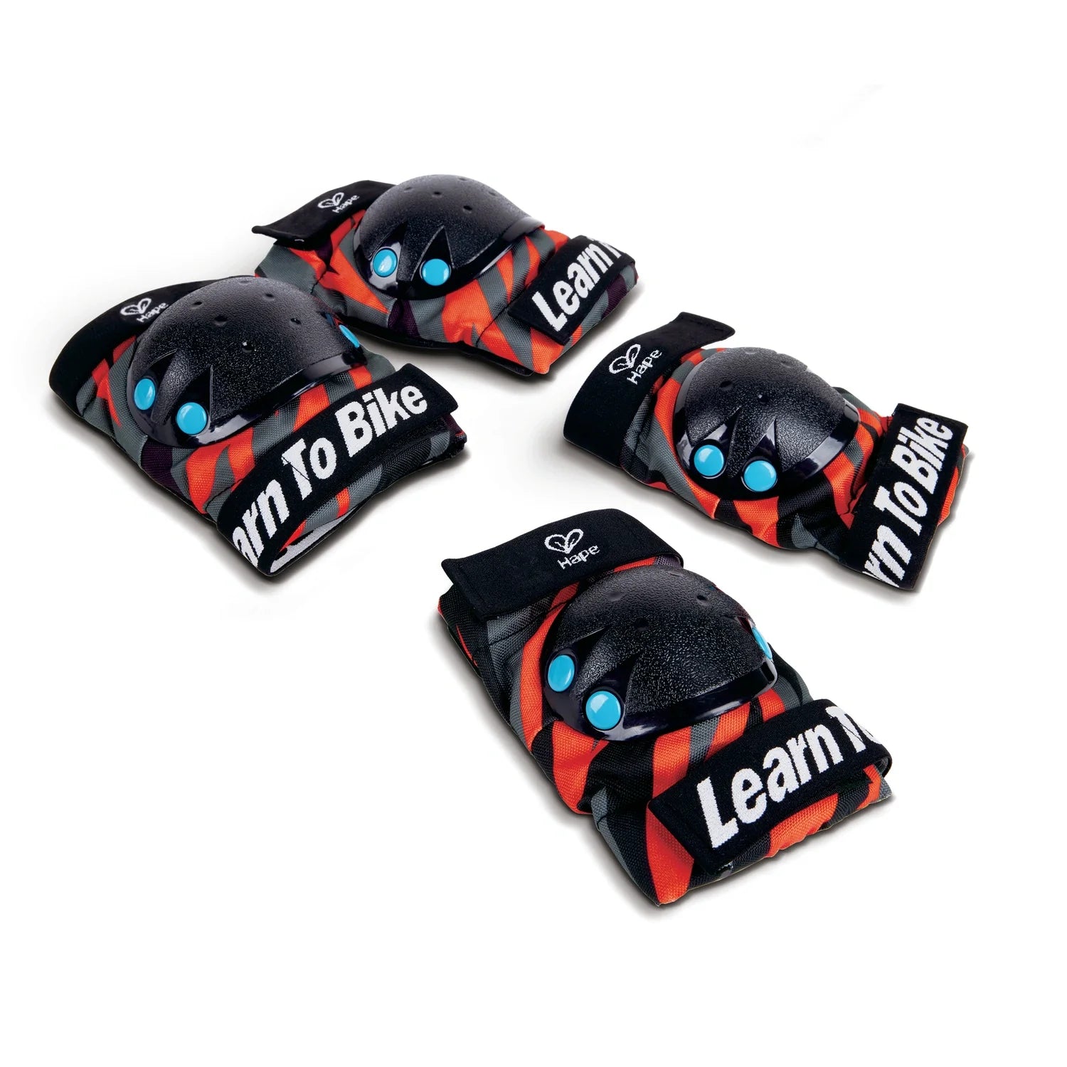 A set of black protective knee and elbow pads with orange stripes and text 'Learn To Ride'