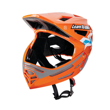 A bright orange Hape Sports Rider Safety Helmet with a full face coverage and adjustable chin strap, designed for children learning to ride balance bikes.