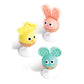 A set of colorful animal-shaped rattles with silicone ears, each with a suction cup for attaching to surfaces.