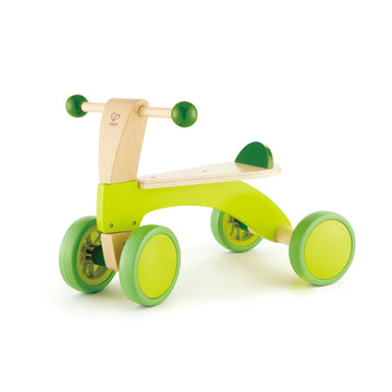 A green and beige wooden push toy with rubberized wheels designed for toddlers.