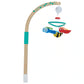 A colorful baby mobile with three fabric bugs and a music box, fastened to a wooden arm that is designed to be attached to a cot or change table.