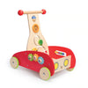 A colorful wooden baby walker with red base and multicolored toys attached, including gears and balls.