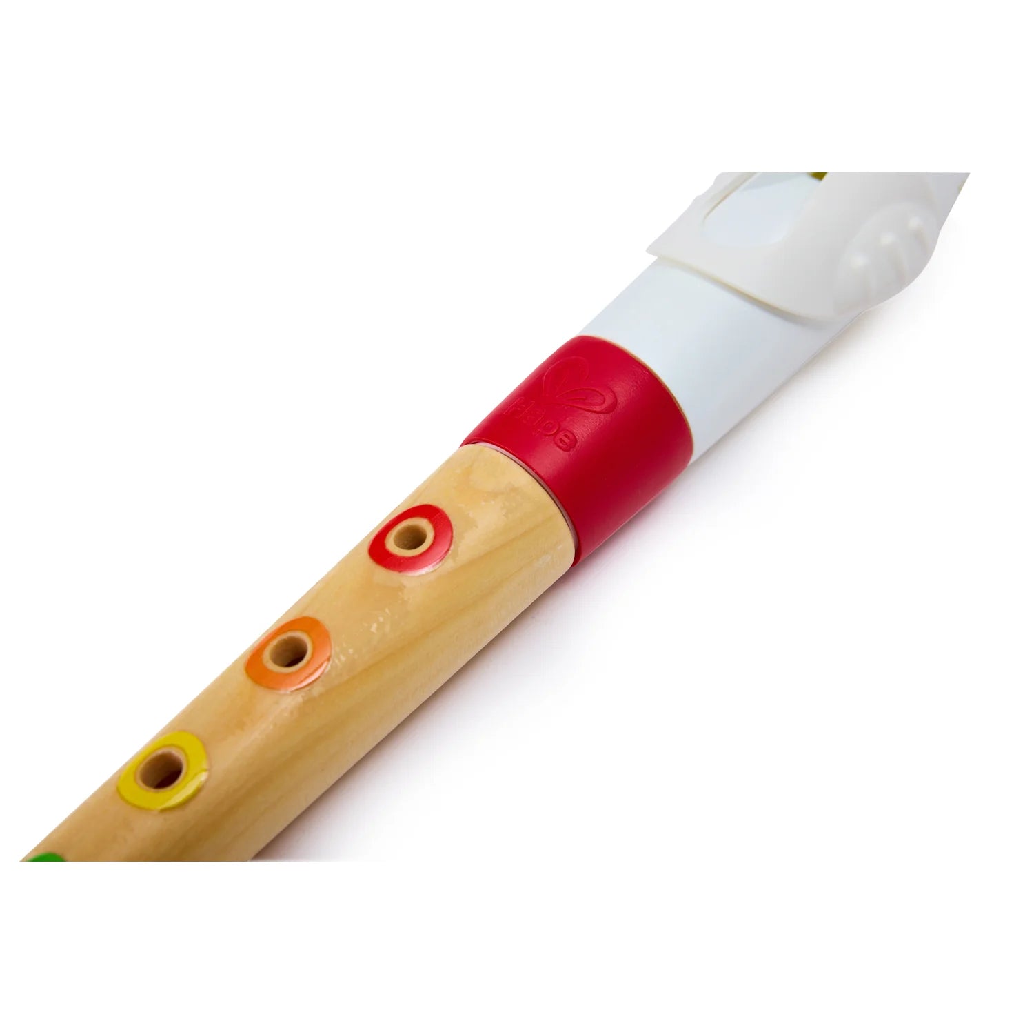 Wooden flute with colored holes on a white background