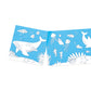 Illustrated open book with ocean-themed drawings on a blue background