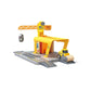 Toy construction crane with a truck on a white background
