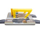 Tile cutting machine with yellow handle on a white background