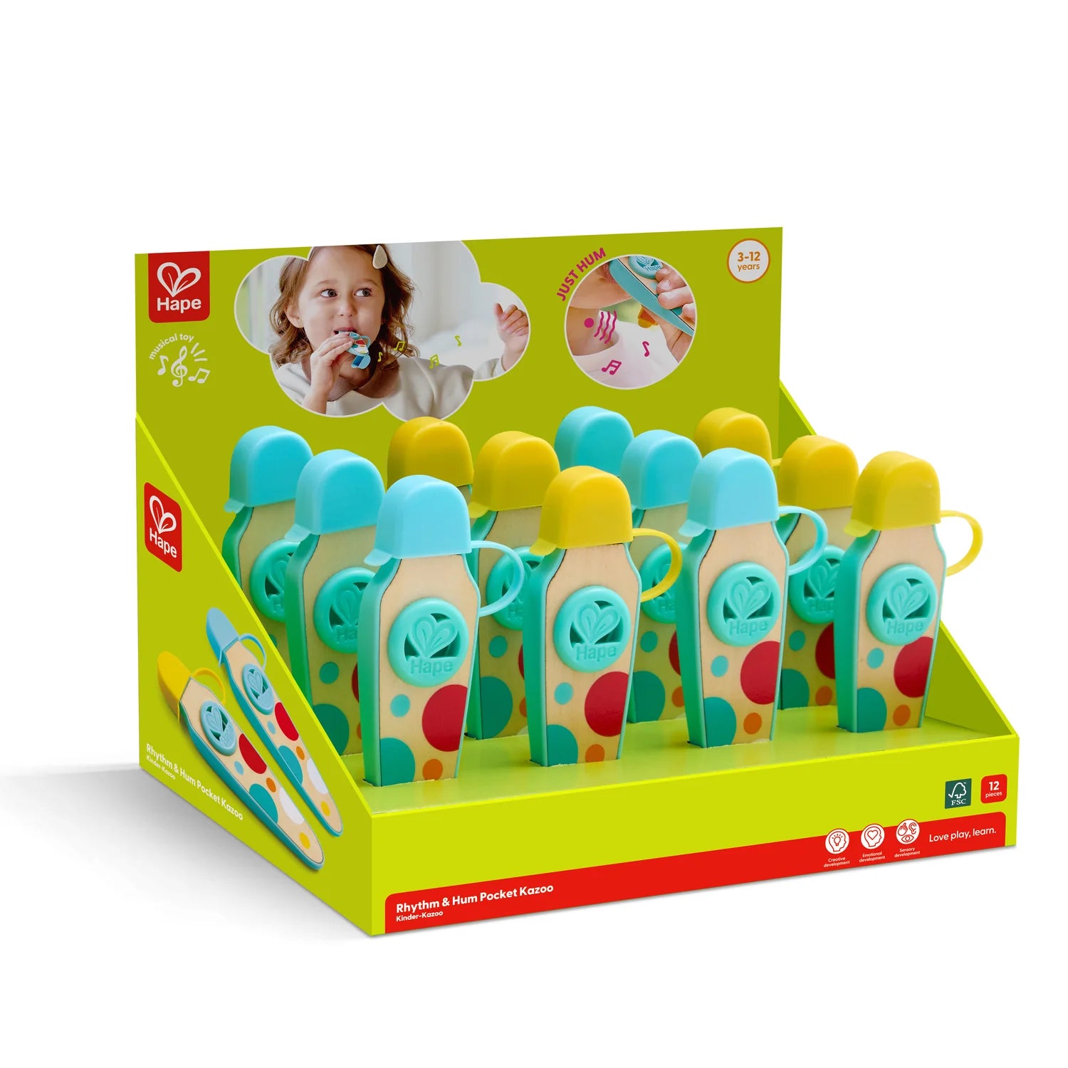 Display box of Hape toys with colorful packaging on a white background