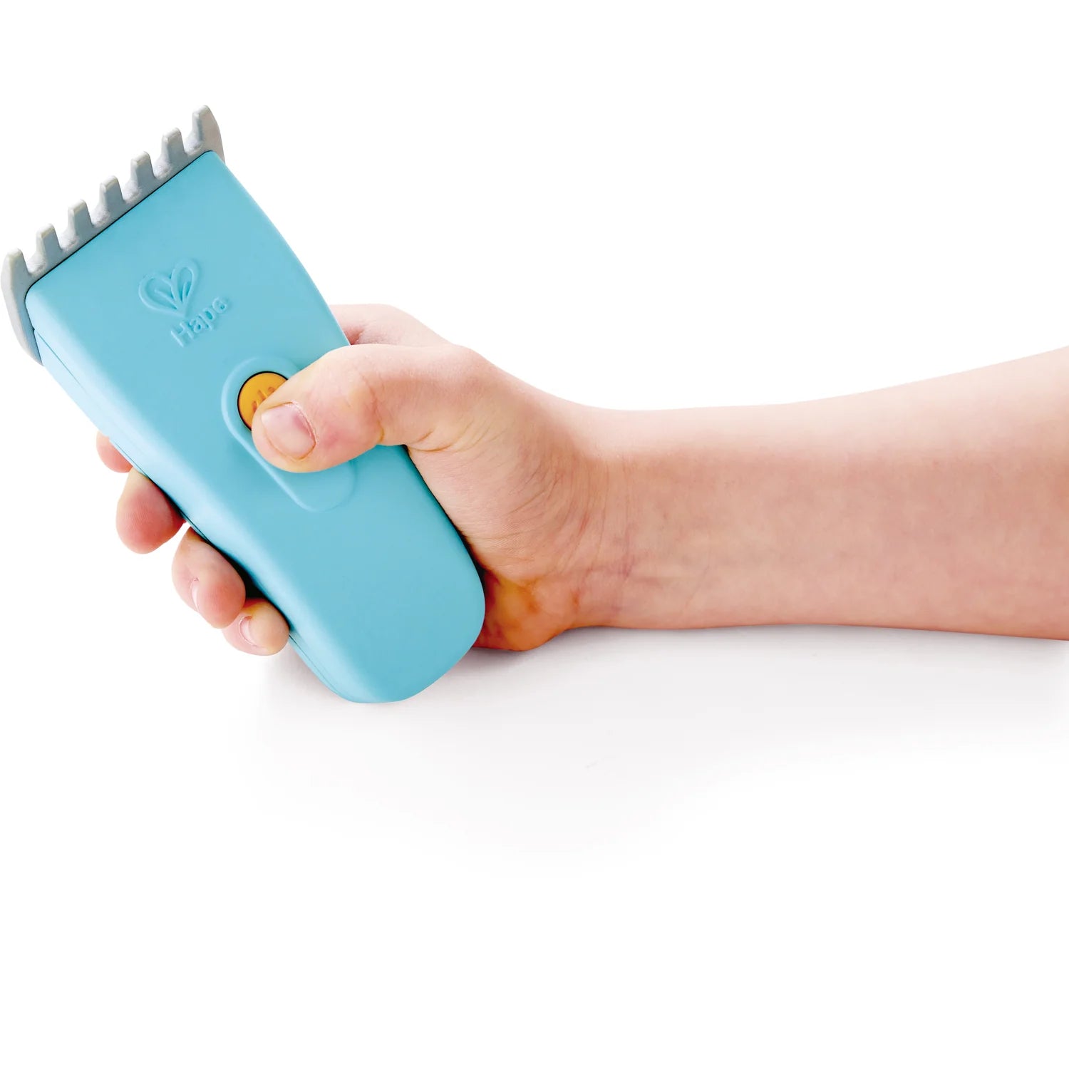 Hand holding a blue pet grooming tool on a white background