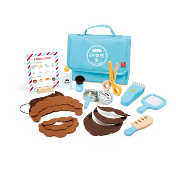 Barber shop toy set with tools and accessories on a white background