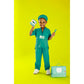 Child in green medical scrubs with a toy stethoscope and bag on a yellow background