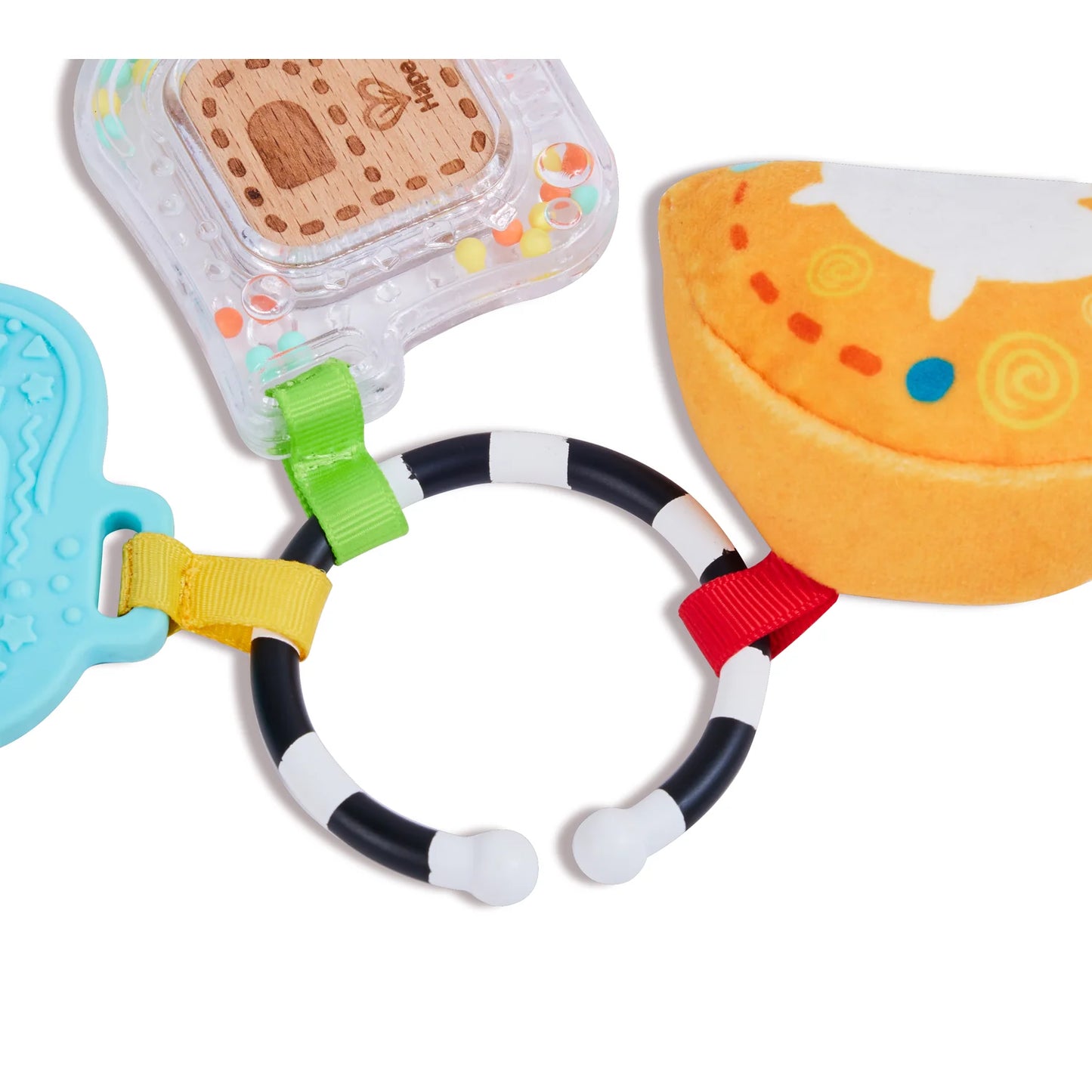 Colorful baby teething ring with various shapes and textures on a white background