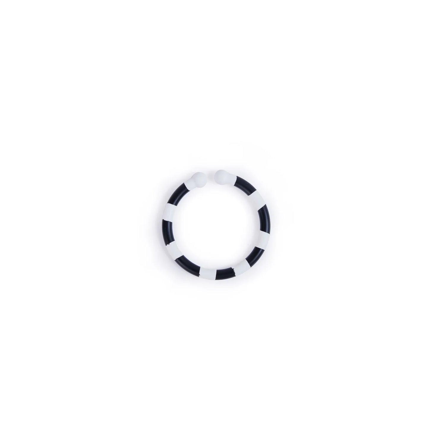 Black and white circular object on a white background