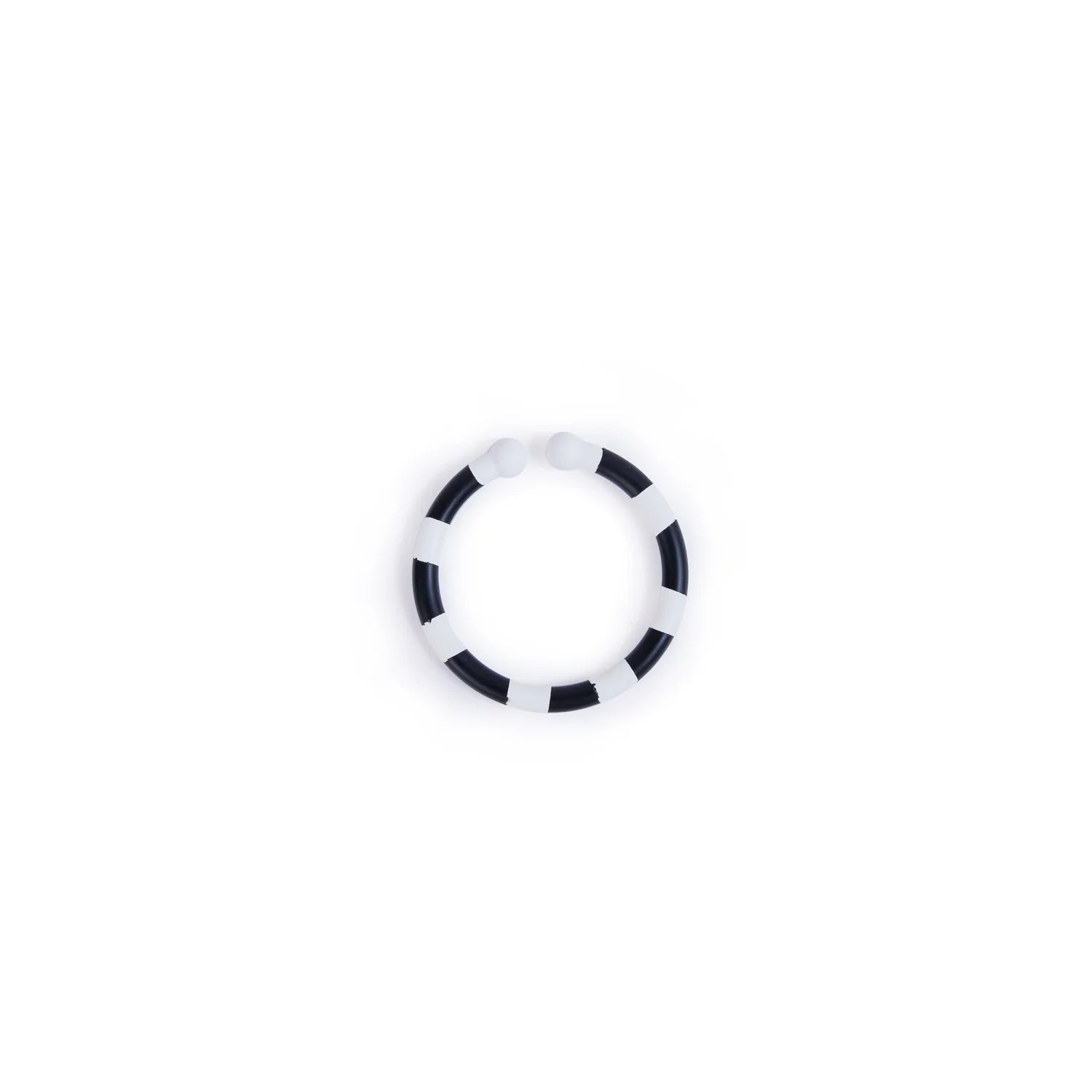 Black and white circular object on a white background