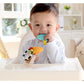 Baby sitting in a high chair with colorful teething toys
