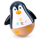 Toy penguin with wooden base on a white background