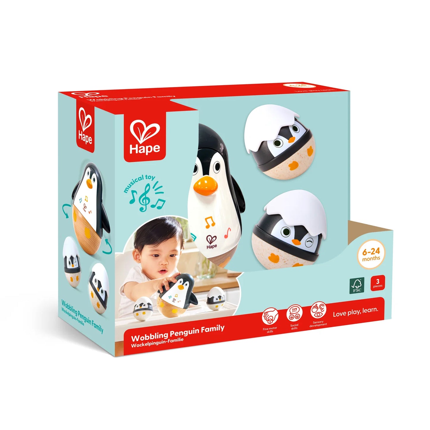 Hape Wobbling Penguin Family toy set packaging on a white background